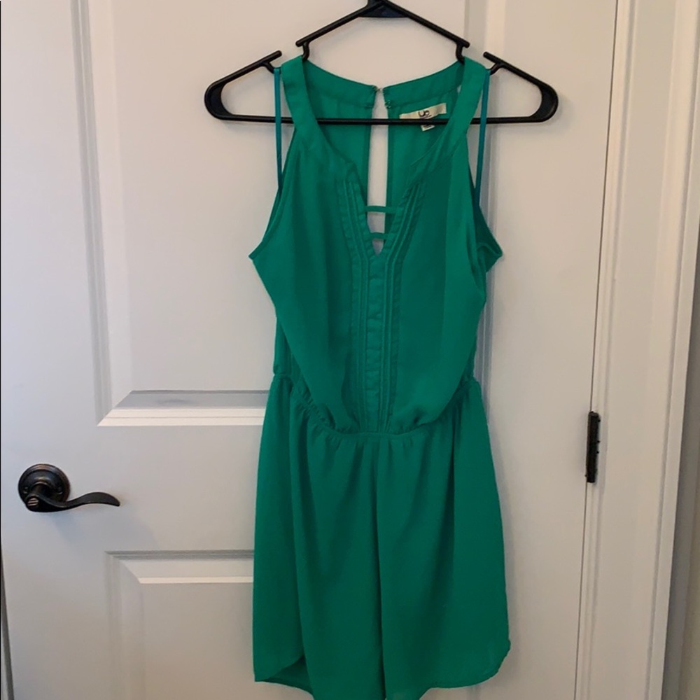 Green open back romper
